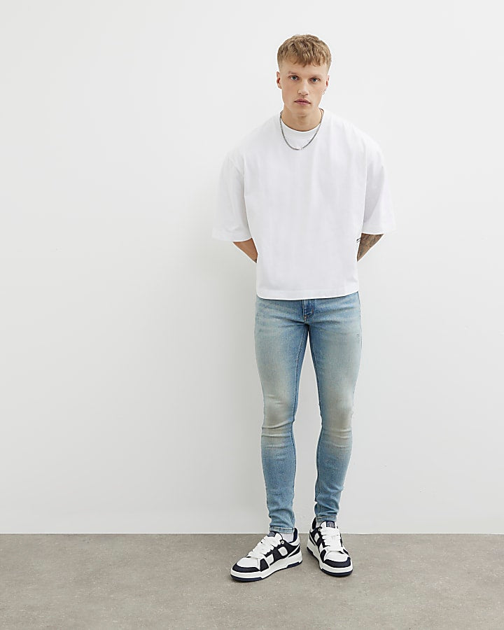 Blue Spray On Skinny Jeans