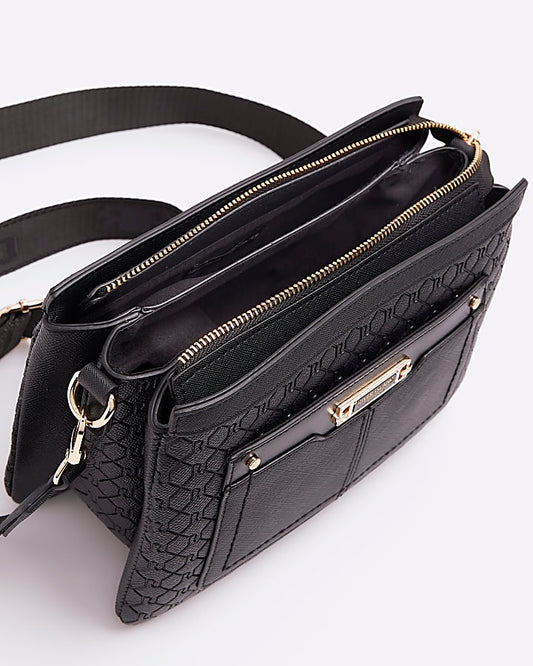 Black embossed monogram cross body bag