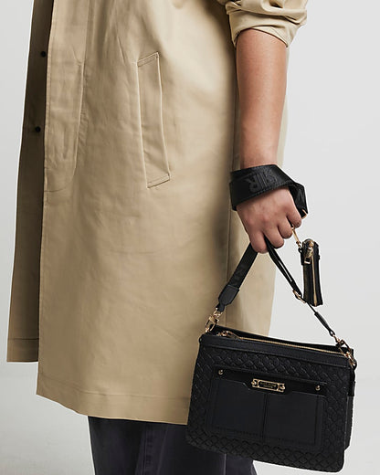Black embossed monogram cross body bag